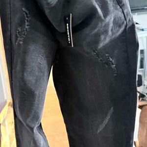 Sleek Black Distressed Women's Skinny Jeans